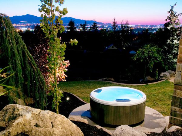 Bullfrog Spa in backyard with city view