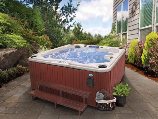 CalSpa hot tub in backyard
