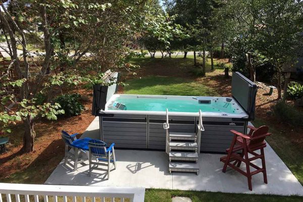 Endless Pool swim spa with steps and cover